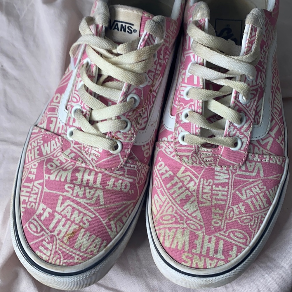 Pink and white vans.